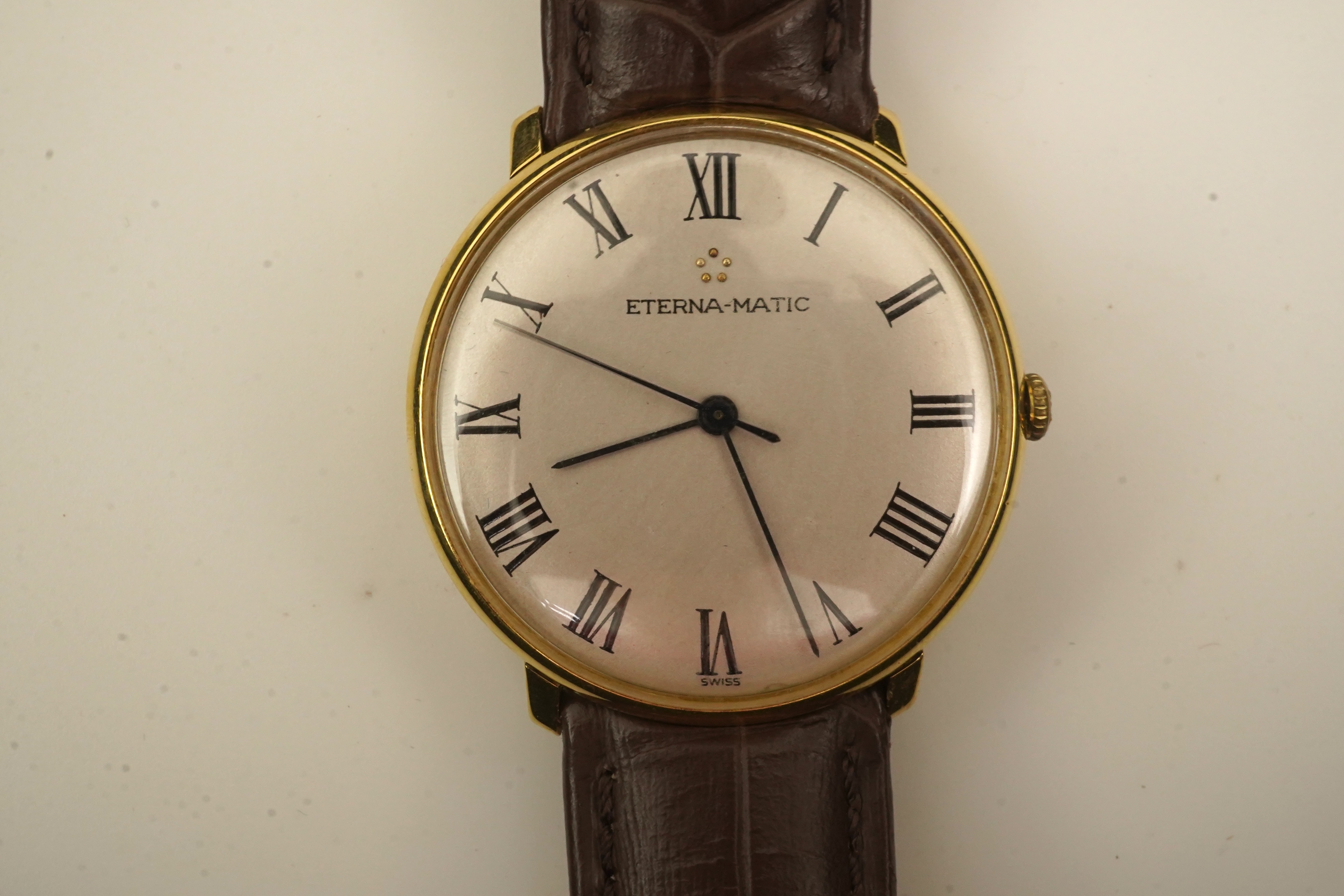 A gentleman's 18ct gold Eterna-Matic manual wind dress wrist watch, on a later associated Hirsch leather strap